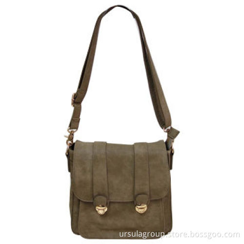 Cross bag with two lock closures on front flap
